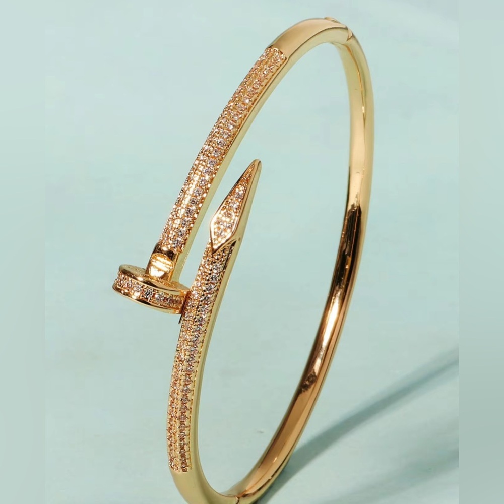 Elegant Gold Tone  Bangle Bracelet with Rhinestone.